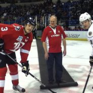 Dropping the first puck.